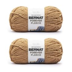 two skeins of yarn with the words bernat forever written on each ball