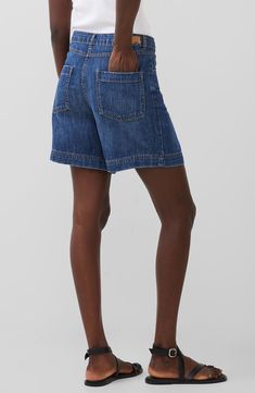 With a relaxed fit and sturdy nonstretch-denim design, these chic Bermuda shorts are destined to become a warm-weather staple. 5 1/2" inseam; 30" leg opening; 12" front rise; 13" back rise Zip fly with button closure Five-pocket style 100% cotton Machine wash, line dry Imported Summer Medium Wash Bottoms With Patch Pockets, Spring Utility Denim Blue Shorts, Casual Medium Wash Jean Shorts With Patch Pockets, Spring Mid-rise Jean Shorts With Patch Pockets, Relaxed Fit Mid-rise Shorts With Patch Pockets, Relaxed Fit Utility Jean Shorts, Mid-rise Relaxed Fit Shorts With Patch Pockets, Mid-rise Summer Shorts With Patch Pockets, Summer High-rise Jean Shorts With Patch Pockets