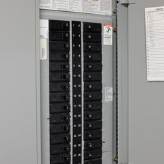 an electrical panel with many different types of switches