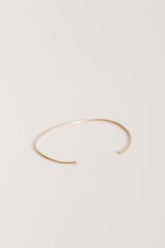 This delicate cuff add just the right amount of sparkle for day or night. METAL14kt Yellow Gold6.5 in around .75 in opening1.5mm STONES1.2mm White Diamonds Classic Adjustable Bracelet With Open Band, Timeless Adjustable Cuff Jewelry, Timeless Adjustable Stackable Cuff Bracelet, Classic Adjustable Open Band Bracelet, Adjustable Yellow Gold Open Cuff Jewelry, Modern Cuff Jewelry For Everyday, Classic Adjustable Open Cuff Bangle, Classic Adjustable Open Cuff Bracelet, Classic Open Band Bracelet As Gift