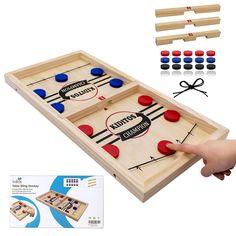 the game is being played with wooden pieces