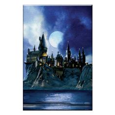 the hogwarts castle is lit up at night in front of a full moon