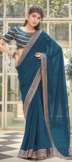 Blue color Saree in Shimmer fabric with Embroidered, Mirror, Zari work Embellished Blue Saree For Diwali, Blue Embellished Saree For Eid, Blue Embellished Saree For Festivals, Festive Blue Embellished Saree, Blue Saree With Resham Embroidery For Celebration, Blue Dupatta With Mirror Work For Celebration, Blue Color Saree, Reception Saree, Shimmer Fabric