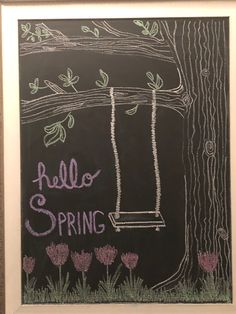 a chalkboard drawing of a swing and flowers with the words hello spring written on it