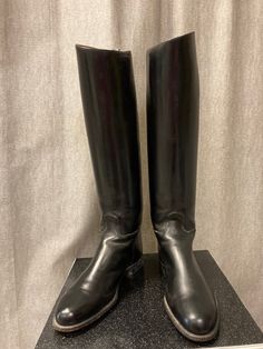 "These superb quality riding boots are made by Dehner's of Omaha. Dehner was established in Kansas in 1875, originally making custom made boots for the cavalry. Today in Omaha they make the highest quality Polo and riding boots as well as biker and law enforcement boots. They also make custom shoes and boots. These boots were custom made as there is a name, Mrs D Knight, printed on the inside. There is no shoe size marked but I think they are size 8. The outer sole is 29cm from heel to tip of to Classic Riding Knee-high Boots, Classic Black Knee-high Riding Boots, Classic Knee-high Riding Boots, Classic Round Toe Knee-high Riding Boots, Classic Knee-high Moto Boots For Formal Wear, Classic Knee-high Moto Boots For Formal Occasions, Western Moto Boots For Riding With Leather Lining, Western Moto Boots With Leather Lining For Riding, Classic Snip Toe Knee-high Boots For Winter