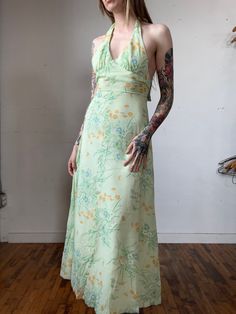 Has some slight discoloration on the armpit 16" Pit to Pit  26" Waist  40" Hip  57" Length All sales final, please ask any questions before buying - Thanks! 1970s Style Green Summer Dresses, Vintage Summer Maxi Dress, 1970s Green Floral Print Dress, 1970s Style Green Floral Print Dress, Summer Vintage Dress With V-neck, Retro Vintage Print Maxi Dress For Summer, Retro V-neck Maxi Dress For Spring, Retro Summer Maxi Dress With Vintage Print, Retro Maxi Dress With Vintage Print For Summer