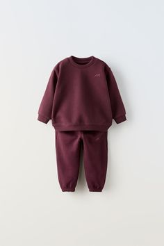 EMBROIDERED SWEATSHIRT AND JOGGERS MATCHING SET - Burgundy | ZARA United States Tracksuit For Jogging With Ribbed Cuffs, Tracksuit With Ribbed Cuffs For Jogging, Sporty Fleece Sets With Long Sleeves, Sporty Fleece Long Sleeve Sets, Sporty Cotton Long Sleeve Set, Sporty Long Sleeve Fleece Sets, Fall Long Sleeve Sweats With Elastic Waistband, Cotton Tracksuit With Elastic Cuffs, Cotton Tracksuit With Elastic Cuffs Sportswear