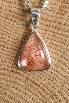 Sunstone Pendant Approx. Dimensions: 22x20x6 mm This pendant is made with .925 Sterling Silver. Chain is not included. Sunstone is a beautiful and unique feldspar mineral known for its shimmering and sparkling appearance. It belongs to the same mineral family as moonstone and labradorite, and it's valued for its warm colors and intriguing optical effects. Sunstone is primarily composed of a variety of feldspar known as oligoclase, often with the presence of hematite or goethite inclusions that c Sunstone Gemstone Jewelry As Gift, Silver Sunstone Jewelry As A Gift, Silver Sunstone Jewelry For Gift, Spiritual Sunstone Jewelry For Gift, Spiritual Sunstone Jewelry As A Gift, Sunstone Gemstone For Jewelry Making, Sunstone Gemstone Jewelry For Jewelry Making, Silver Sunstone Jewelry With Gemstone, Silver Sunstone Jewelry With Natural Stones