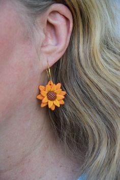 Handmade polymer clay earrings with floral pattern. Length of the earring is 4 cm ( 1.6 inch ).  P R O D U C T   I N F O  Earrings are lightweight and comfortable to wear. Every little detail is slowly made by hand. The studs are made out of stainless steel, so they are hypoallergenic. Patterns can vary from pair to pair ( because every piece is handmade ). Each pair is completely unique.  C A R E   I N S T R U C TT I O N S I don't recommend  sleeping or swimming with them. To clean simply rub with wet piece of cloth. Pleas, treat the earrings gently. Polymer clay is very strong, but needs removing carefully from you're ears. P A C K A G I N G   A N D    S H I P P I N G Orders will be carefully packed in a recyclable cardboard box.  F O L L O W   M E Be sure to follow Karmel art on instagr Hypoallergenic Flower-shaped Polymer Clay Jewelry, Flower Shaped Polymer Clay Earrings For Gift, Dangle Earrings With Flower Charm In Polymer Clay, Clay Flower Earrings For Gift, Clay Flower Earrings As Gift, Adjustable Polymer Clay Flower Earrings, Delicate Flower-shaped Clay Earrings For Gifts, Dangle Flower Earrings In Polymer Clay, Dangle Flower Earrings In Polymer Clay For Gifts