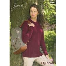 a woman leaning against a tree with a purse on her shoulder and the words, sever