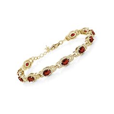 PRICES MAY VARY. Exquisite Gemstone Elegance: This stunning tennis bracelet boasts a total carat weight of 9.87, featuring a series of oval-cut red garnet gemstones. The rich red hue of the garnets exudes elegance and sophistication, making this bracelet a timeless addition to any jewelry collection. Luxurious Gold Plated Silver Setting: Crafted with high-quality 18K yellow gold plated silver, this bracelet offers a luxurious and durable design. The gold plated silver setting beautifully complem Red Oval Diamond Bracelet As Gift, Red Oval Diamond Bracelet For Gift, Red Oval Diamond Bracelet Gift, Red Oval Diamond Gemstone Bracelet, Oval Ruby Gemstone Tennis Bracelet, Elegant Oval Bracelets With Gemstone Accents, Red Oval Gemstone Bracelet, Luxury Red Oval Bracelet, Luxury Oval Bracelets With Stones