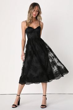 Achieve the picture-perfect romantic look with the Lulus My Darling Daydreamer Black Lace Bustier Midi Dress! A sheer mesh overlay is adorned with intricate floral embroidery (atop a satiny woven liner) as it forms adjustable straps, a sweetheart neckline, and a bustier bodice with padded, underwire cups. The set-in waist boasts strips of hidden boning before flowing into an A-line midi skirt with scalloped trim. Hidden back zipper/clasp. Dark Wedding Guest Dress, Black Corset Dress With Sheer Bodice For Prom, Chic Sleeveless Tulle Corset Dress, Lace Tea-length Prom Dress, Tea Length Lace Prom Dress, Elegant Corset Dress With Lace Patchwork, Elegant Lace Dress With Corset Back For Prom, Elegant Sleeveless Corset Dress With Lace Patchwork, Chic Prom Dresses With Floral Embroidery