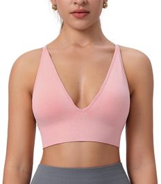 PRICES MAY VARY. Deep V-neckline design enhances sexy breast curves. Adjustable spaghetti straps for personal adjustment. Padded and wireless bra with removable pads for comfort. Made with soft, moisture-wicking fabric for breathability and focus during practice. Versatile push-up bra for medium to low-impact sports and everyday use Yoga Crop Tops, Neckline Designs, Workout Yoga, Wireless Bra, Push Up Bra, Moisture Wicking Fabric, Long A Line, Deep V Neck, Deep V