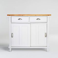 a white cabinet with two drawers and a wooden top