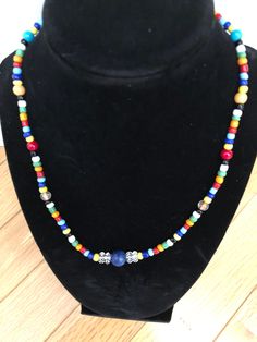 A colorful  fun style necklace with lapis lazuli and clear quartz centerstones. Light and comfortable for summer and beachwear.  No clasp to fumble with, just easy pull over the head stretch cord fashion. Bohemian Lapis Lazuli Beaded Necklaces, Bohemian Rainbow Crystal Necklaces With Colorful Beads, Multicolor Beaded Lapis Lazuli Jewelry, Bohemian Rainbow Crystal Necklace With Colorful Beads, Multicolor Beaded Necklaces With Lapis Lazuli Stones, Multicolor Lapis Lazuli Beaded Necklaces With Natural Stones, Multicolor Lapis Lazuli Necklaces With Natural Stones, Multicolor Lapis Lazuli Natural Stones Beaded Necklace, Bohemian Lapis Lazuli Jewelry With Colorful Beads