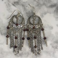 These OOAK chain dangles are made with beautiful amethyst Swarosvki bicone crystals, glass swirl bugle beads, & non-tarnishing, stainless steel chain.  They hang 2 3/4 inches in length on beautiful silver connectors with French ball ear wires.  They're absolutely stunning and can be worn year round Chandelier Dangle Earrings With Dangling Charms For Gift, Silver Chandelier Earrings With Dangling Charms As Gift, Silver Chandelier Earrings With Dangling Beads, Metal Dangle Crystal Earrings, Purple Metal Dangle Earrings, Metal Beaded Earrings As Gift, Silver Dangle Crystal Earrings, Purple Dangle Metal Earrings, Nickel-free Purple Dangle Chandelier Earrings