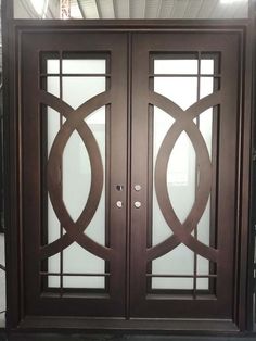 double doors with glass panels on the sides and sidelights are shown in this photo