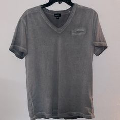 Diesel Acid Washed Gray Short Sleeve Shirt With Pocket Casual Distressed Gray Tops, Casual Washed Gray Tops, Casual Distressed V-neck Top, Gray Relaxed Fit V-neck Shirt, Casual Distressed Cotton Shirt, Casual Cotton Distressed Shirt, Casual Distressed Short Sleeve Shirt, Cap Sleeve Shirt, Orange Tees