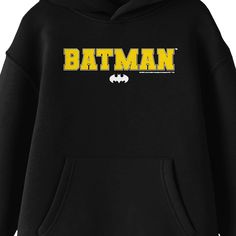 Celebrate the Caped Crusader in comfort with this Batman sweatshirt. The hoodie features an image of Batman's logo under yellow text that spells out the superhero's name. The sweatshirt comes in black with a double-lined hood and a large pouch pocket. Batman fans will love this comfy and cozy hoodie. Batman Sweatshirt, Batman Hoodie, Superhero Names, Caped Crusader, Black Hooded Sweatshirt, Scenery Pictures, Batman Logo, Large Pouch, Cozy Hoodie