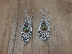 Filigree Peridot Earrings // Dangling Peridot Earrings // 925 Sterling Silver // Hypoallergenic // B Earrings Dangling, Peridot Earrings, Chalcedony Ring, Swirl Earrings, Nail Polish Collection, Stunning Earrings, Girls Earrings, Girls Jewelry, Light Weight Earrings