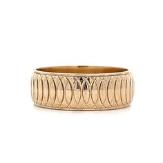 This unique and stylish men's wedding band is the perfect choice for those looking for a touch of vintage charm. Crafted from 14 karat yellow gold, this ring features a circular engraved texture that adds a touch of dimension and character to the band. 7.75mm band is a bold statement. Whether worn as a wedding band or a fashionable accessory, this ring is sure to set you apart from the crowd. Unique Engagement Rings For Men, Engraved Wedding Band, Wedding Band Engraving, Stock Design, Platinum Rose Gold, Sapphire Solitaire, Engraved Wedding, Engagement Rings For Men, Shop Engagement Rings