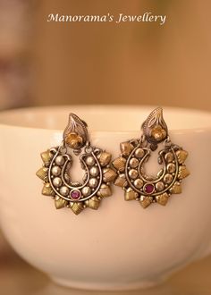 Beautiful two tone chaand baali earrings!! Totally cool, royal and chic! Statement Jewelry. Antique finish earrings. Brass Finish Earrings. Pink Glass Stone. Light Weight Earrings. Earring measure 1 3/4 inches (4 cm) in length. These earrings are made of copper brass alloy and have an antique oxidized finish to them! JEWELERY CARE INSTRUCTIONS Please make sure that these items must be treated with care and stored properly. They can easily be broken if dropped or mishandled. Jewelry should not be Ornate Dual-tone Earrings For Gift, Ornate Dual-tone Earrings As Gift, Ornate Dual-tone Earrings Gift, Multicolor Dual-tone Earrings For Celebration, Multicolor Dual-tone Earrings For Festivals, Festive Multicolor Dual-tone Earrings, Traditional Multicolor Dual-tone Earrings, Dual-tone Temple Jewelry Earrings As Gift, Dual-tone Round Earrings For Celebration