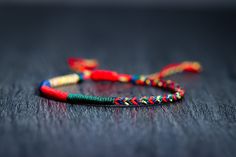 Multicolored bracelets with lucky Buddhist Tibetan knots, handcrafted according to Buddhist tradition ✿ History ✿ The Buddhist tradition of these very special bracelets has its origin in Buddhist temples, where Tibetan monks perform each knot while reciting mantras that infuse intention. Full awareness in this meditative act achieves that the high vibration is transmitted to the bracelets and attract luck and the most positive things to our lives. Their popularity causes them to be chosen by fam Traditional Hand Wrapped Braided Bracelet For Friendship, Traditional Hand-wrapped Braided Bracelet For Friendship, Traditional Hand Wrapped Friendship Braided Bracelets, Traditional Handmade Bracelets For Good Luck, Traditional Beaded Bracelets With Sliding Knot For Friendship, Traditional Beaded Friendship Bracelets, Handmade Bohemian Friendship Bracelets For Good Luck, Handmade Casual Braided Bracelets For Meditation, Traditional Braided Bracelets For Gifts