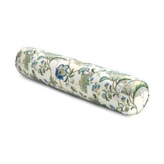 an image of a rolled up pillow on a white background with blue and green flowers