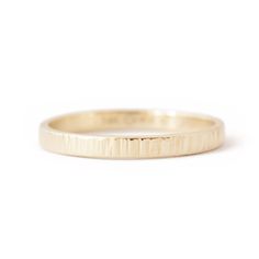 Hammered by hand in our Vermont studio, this wedding ring delivers everything that is timeless and classic about a simple forged gold band but with an organic feel. Our ethical sourcing and human-to-human communication ensure this symbol of your love is made with love every step of the way! Band and Width: A half-round 2mm, or 5mm wide band. Measuring approximately 1.55mm off the finger.Metal: Pictured here in 14k rose gold and 14k yellow gold with a cross-peen "thatched" texture. Sourcing note: Human Communication, Multiple Rings, Rings Cool, One Ring, Multi Stone Ring, Wide Bands, Types Of Rings, Gold Band, Perfect Ring