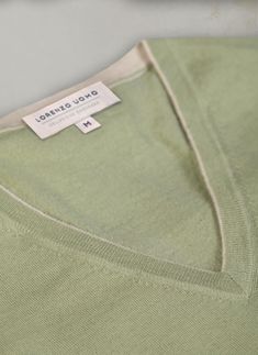 Indulge in our buttery-soft Cashmere/Extrafine Extra Lightweight Merino V-neck sweaters. Made with 2 twisted plies of the finest blended yarn, this garment is extremely versatile--perfect for wearing under a sportcoat--without any constraint in motion--or simply wear outdoors in spring or summer. This light garment features thoughtful details throughout, such as a 1/8” contrast at the inside edge of the collars and at the tip of the wrists. The cashmere originates from Arbas cashmere goats from Turtleneck Hoodie, Perfect White Shirt, St Barths, Hoodie Cardigan, Sport Dress, Business Dresses, Womens Size Chart, Tie And Pocket Square, Full Zip Hoodie