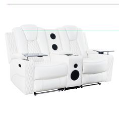 two white recliners sitting next to each other