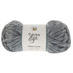 yarn ball in grey with white label