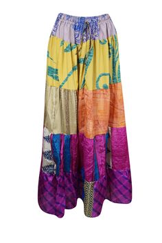 Elevate your wardrobe with the vibrant charm of this flared maxi skirt, expertly crafted from upcycled saree fabric. Showcasing rich Purple and Multi floral tones, complemented by bold, striking prints, each skirt is a unique masterpiece. Its adjustable drawstring waist and flowing ankle-length silhouette provide a flattering, comfortable fit, making it the perfect blend of boho-chic style and everyday practicality. Whether you're wandering through a farmer's market or dancing at a lively beach Festive Multicolor Long Skirt, Festive Long Multicolor Skirt, Vibrant Flowy Maxi Skirt, Bohemian Multicolor Skirt For Festivals, Traditional Multicolor Maxi Skirt, Bohemian Multicolor Festival Skirt, Bohemian Maxi Skirt For Festive Occasions, Multicolor Bohemian Maxi Skirt For Festivals, Multicolor Long Maxi Skirt For Festivals