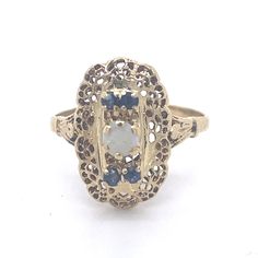 Antique Opal Ring, Vintage Sapphire ring, 14k Yellow Gold, Vintage Ring, Antique jewelry, Estate jewelry, vintage opal jewelry, jewelry gift Jewelry Yellow Gold 14k  (the gold has been tested by a professional) Total Carat Weight:0.28ct (Approx.) Total Metal Weight: 2.4g Size:6 US \ 16.51 mm (inner diameter) Vintage Opal Jewelry For Anniversary, Vintage 14k Gold Sapphire Birthstone Ring, Antique Opal Rings For Collectors, Heirloom Yellow Gold Opal Ring Collectible, Antique Opal Rings Collectible, Antique Opal Rings For Collectible, Victorian Style Gold Opal Ring With Multi-stone, Vintage Opal Rings In Yellow Gold, Vintage Multi-stone Yellow Gold Opal Ring