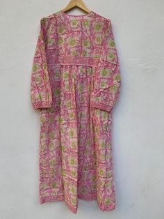 "ITEM DESCRIPTION Blossom pink and green floral print boho maxi dress - cotton long dress - boho hippie maxi dress Features : Long sleeve, V neck, Long dress Material : Cotton Voile Fabric: 100% cotton soft light weight ethnic print fabrics Sleeve Length = 22 inch (approx) For more sizes & their measurement, please refer our below chart to understand the sizes variations available with us For your size requirement, please mention your size in seller note at the time of buying. SIZE MEASUREME Green Floral Print Dress, V Neck Long Dress, Hippie Maxi Dress, Cotton Voile Fabric, Cotton Long Dress, Voile Fabric, Bohemian Blouses, Green Floral Print, Ethnic Print