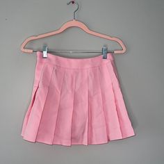 Pink Tennis Skirt Runs Large (Small/Medium Fit) Preppy Pleated Bottoms For Spring, Solid Color Mini Tennis Skirt For Spring, Spring Solid Mini Tennis Skirt, Spring Solid Color Mini Tennis Skirt, High-waisted Pink Pleated Skort, High Waist Pleated Pink Skort, Spring Mini Skort With Pleated Details, Spring Pleated Tennis Skirt, Spring Pleated Mini Skort