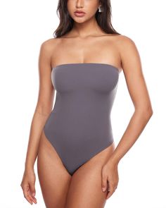 PRICES MAY VARY. Natrelax Collection - Crafted from soft and elastic fabrics, offering a second-skin feel and a smoothing effect, ensuring ultimate comfort Non-Slip strapless design provides a tight fit without slipping Double-layer fabric for not see-through and supportive fit. You can wear it even without a bra 4-way stretch fabric and bodycon design create a figure-hugging fit Thong-cut bottom for seamless wear, snap closures for easy on/off Perfect casual bodysuit for everyday wear, going ou Solid Color Stretch Backless Leotard, Stretch Seamless One-piece Leotard, High Cut Leotard With Built-in Bra, High Cut Solid Leotard With Lined Body, Strapless Stretch Seamless Swimwear, Strapless Seamless Stretch Swimwear, Solid Color Bodysuit With Built-in Bra And Micro-elastic Fit, Stretch Backless Leotard With Smoothing Details, Stretch Smoothing Backless Leotard