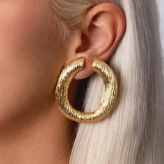 Make a statement with the Stacy Earrings, where big, bold, and boujee collide. Crafted from original 60s-90s jewellery, these earrings redefine vintage style with a powerful, eye-catching design. Perfect for those who want to stand out, they bring a touch of glam to any outfit while embracing sustainable fashion. * 18ct gold-plated earrings * 4.5cm length   * Clip on Earring fastening  * Original vintage earrings * Avoid contact with make-up and chemical cleaning products 90s Jewellery, 90s Jewelry, Clip On Earring, Gold Plated Earrings, Cleaning Products, Vintage Earrings, Style Vintage, Clip On Earrings, Sustainable Fashion