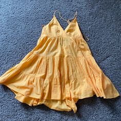 Never Worn Before Urban Outfitters V-neck Sundress For Summer, Urban Outfitters Cotton Sundress For Vacation, Urban Outfitters Ruffled Sundress For Day Out, Chic Urban Outfitters Sundress For Spring, Urban Outfitters V-neck Beach Dress, Urban Outfitters V-neck Mini Dress For Summer, Urban Outfitters Ruffled Sundress For Beach, Urban Outfitters Yellow V-neck Dress, Urban Outfitters V-neck Vacation Dress