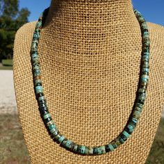 "Excellent quality! Genuine, natural green blue African heishi Turquoise gemstone and sterling silver necklace. These turquoise gemstones are NOT dyed. Bead size: 6mm - MEDIUM Lengths include 2\" extender chain. Example: 16\" + 2\" extender = 18\" total length to end of extender If you do not want extender - please send me a note MATCHING BRACELET: https://www.etsy.com/listing/881938238/4mm-african-turquoise-heishi-bracelet?ref=listing_published_alert All photos taken up close OUTDOORS in natura Rondelle Turquoise Necklace With Natural Stones As Gift, Turquoise Rondelle Necklace With Natural Stones For Gifts, Single Strand Turquoise Chrysocolla Necklace, Turquoise Chrysocolla Necklace With Round Beads As Gift, Turquoise Rondelle Necklace For Gift, Southwestern Turquoise Chrysocolla Necklace, Gift Turquoise Emerald Necklace With Polished Beads, Turquoise Rondelle Necklace With Polished Beads For Gifts, Green Turquoise Necklace Hand-strung As Gift