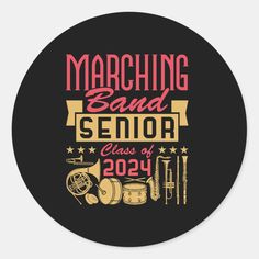 marching band senior class round sticker with the words marching and musical instruments on it