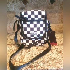 Nwt High Park Checkered Black And White Crossbody Bag. Zipper Closure, 1 Front Pocket And 1 Inside Pocket With Adjustable Strap. This Retro Patterned, Checker Board Pattern Will Have You Standing Out In The Crowd. Buy With Confidence. Fast Shipping. Five Star Seller. Thanks For Viewing And I Look Forward To Doing Business With You... White Rectangular Shoulder Bag For Streetwear, White Bags With Adjustable Strap For Streetwear, White Crossbody Shoulder Bag For Streetwear, White Bag With Adjustable Strap For Streetwear, White Streetwear Bag With Adjustable Strap, White Zipper Closure Bag For Streetwear, Checkered Black And White, Checker Board, White Crossbody Bag