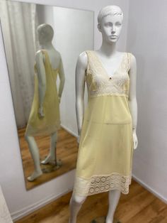 Yellow vintage slip dress, M size.   1980s 100% polyamide Size: 38/M Length: 107 cm / 42.1 inches Bust:  92 cm / 36.2 inches Waist: 84 cm / 33.07  inches Hips: 94 cm / 37 inches  * Please note that actual colors may vary due to your computer resolution and monitor color restrictions *Clothes  from smoke free house *Please contact me if you have any questions Thank you visiting my shop Instagram  - IvziteVintageFashion Ilze Vintage V-neck Slip Dress For Spring, Sheer Camisole Slip Dress For Daywear, Vintage Silk Slip Dress With Spaghetti Straps, Vintage Silk Dress With Spaghetti Straps, Vintage Bias Cut Slip Dress With Spaghetti Straps, Vintage Sleeveless Silk Slip Dress, Sheer Vintage Slip Dress, Sheer Sleeveless Slip Dress For Daywear, Vintage Camisole Slip Dress For Daywear