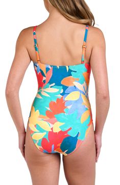 An eye-catching pattern lends tropical energy to this ruched one-piece swimsuit topped by slender straps. Square neck Adjustable straps Moderate back coverage Lined, with removable soft cups 83% nylon, 17% elastane Hand wash, dry flat Imported Floral Print Swimwear With Spaghetti Straps For Poolside, Floral Print Spaghetti Strap Swimwear For Beachwear, Floral Print Spaghetti Straps Beachwear Swimwear, Floral Print Beachwear With Spaghetti Straps, Floral Print Swimwear With Spaghetti Straps For Beach Season, Printed Spaghetti Strap Swimwear For Summer, Printed Summer Swimwear With Spaghetti Straps, Multicolor Strapped Swimwear For Vacation, Multicolor Strapped Swimwear For Pool