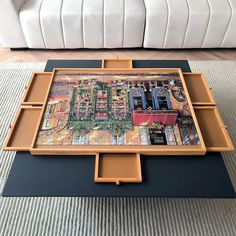 a coffee table with an art work on it