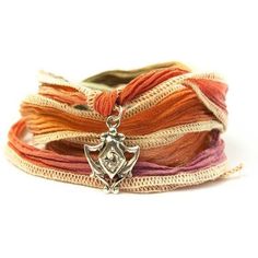 Crystal Crest Jewelry, Silk Wrap Bracelet, Eco-friendly, Boho Chic, Tie Dye, Wrap Bracelet, Yoga Jewelry, Ombre Ribbon. Our charms are cast in lead free pewter then plated with precious metals that are copper, 24k gold and .99 sterling silver. These silk ribbons can be ironed to create a more "ribbon" look versus the natural, crinkle state. Some colors may bleed when wet so it's best to avoid wearing while swimming or showering. To wash, simply rinse in cold water and hang dry. Handmade in the U Silk Wrap Bracelets, Yoga Jewelry, Tie And Dye, Silk Wrap, Braided Bracelets, Silk Ribbon, Arm Candy, Precious Metals, Wrap Bracelet