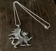 Medieval Dragon Pendant - Pictured with optional 1.4mm sterling silver rope chain. 925 Sterling Silver Finish: oxidized Method: Casting Weight: 10 grams Length: 49mm Hallmark: 925 Free Domestic Shipping Chain sold separately Cast Gifts, Medieval Dragon, Silver Rose Ring, Silver Dragon Necklace, Silver Rope Chain, Dragon Ring, Dragon Necklace, Southwest Jewelry, Turquoise Ring Silver