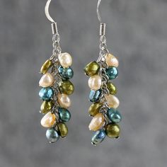 Colorful pearl dangling chandelier earrings by AnniDesignsllc Pearl Cluster Earrings, Long Pearl Earrings, Handmade Jewlery, Pearl Dangle Earrings, Earrings Bridesmaid, Spiral Earrings, Green Pearls, Pearl Cluster, Heart Drop Earrings