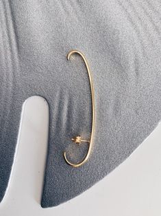 A minimalist design with simple lines and geometric shape fits . It's light and comfortable to wear . -Total length 10cm / 3.93 inches -From stud to bottom 1,5cm / 0.59 inches I use 925 Sterling Silver and then double gold plated with 22k gold. I do not use molds, every piece of jewelry is made from sterling silver sheet and wire. All of my jewelry is handmade please allow for small variances from piece to piece ,as this is a feature of owning one of the kind original handmade jewelry. Please be Minimalist Ear Cuff With Matching Earrings, Minimalist Gold-plated Ear Climbers, Minimalist Ear Cuff With Matching Earrings For Everyday, Modern 14k Gold Single Ear Cuff, Minimalist Ear Cuff With Matching Earrings As Gift, Minimalist Single Ear Cuff As Gift, Modern Gold Cartilage Earring, Minimalist 14k Gold Single Ear Climber, Minimalist 14k Gold Ear Climbers As Gift