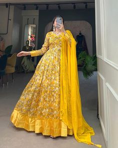 Yellow Floor Length Tussar Silk Gown with Chiffon Dupatta, Haldi Dress - Modest, Flowing, and Luxurious Design, Ready to Wear, Ship to USA, Womens Dress Readymade, SheGemStudio M(38''), L(40''), XL(42''), XXL(44'') Occasions - Special Wedding Outfit / Festive Wear PACKAGE CONTAINS - Gown + Dupatta Premium Designer Readymade Gown-Dupatta Collections. 👗 Gown (Fully Stitched) Fabric - Tussar Silk Work - Print With Foil Print Chest Size - 40 (Inside 2 inch extra margin support up to 38" to 42" for Haldi Dress, Lehenga Choli Designs, Lehenga Crop Top, Gown With Dupatta, Lehenga Choli Wedding, Yellow Gown, Party Wear Lehenga Choli, Reception Gown, Party Wear Gown